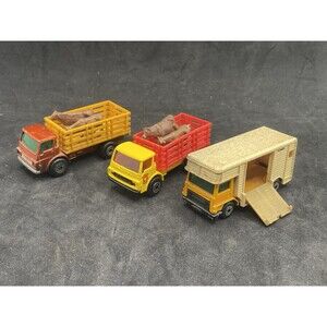 2 Matchbox #71 Cattle Trucks with Brown Cows 1976 and 1977 Horse Box Truck #40